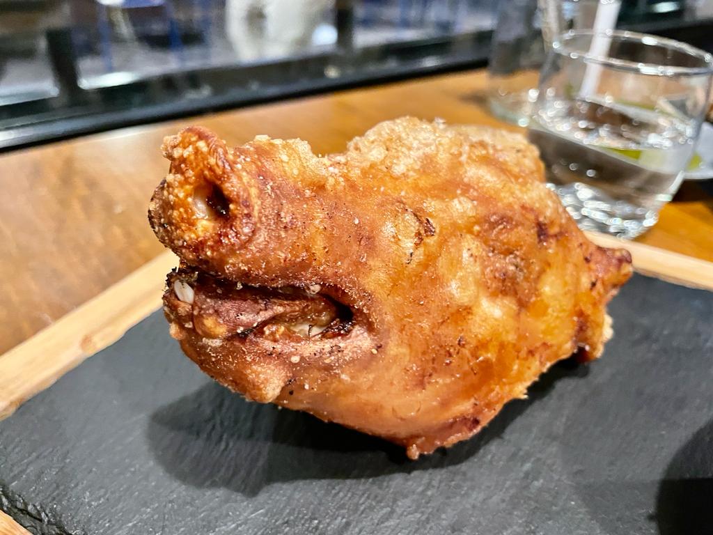 La cabeza de un cochinillo 0