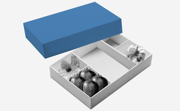 Una mesa viva y doce maletas 0