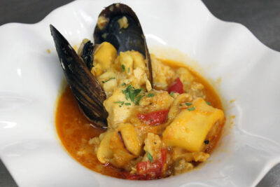 Estofado de patatas y chipirones a la marinera en Barbiana. Foto: Barbiana