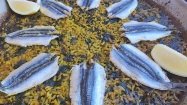 Arroz con boquerones y espinacas de Haití