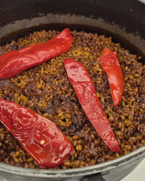 arroz a banda del caldero de pescado de Diego René en Beluga