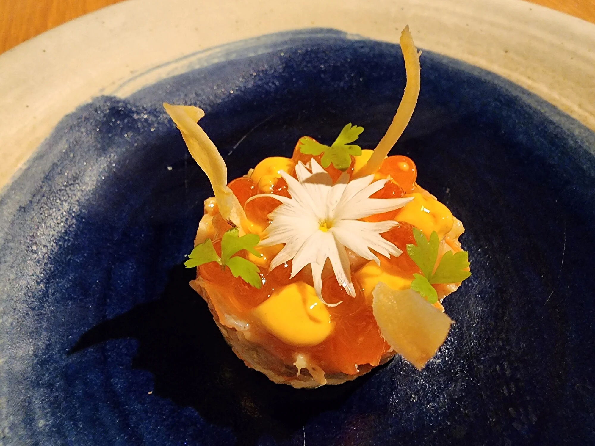 Centollo con curry de Goa