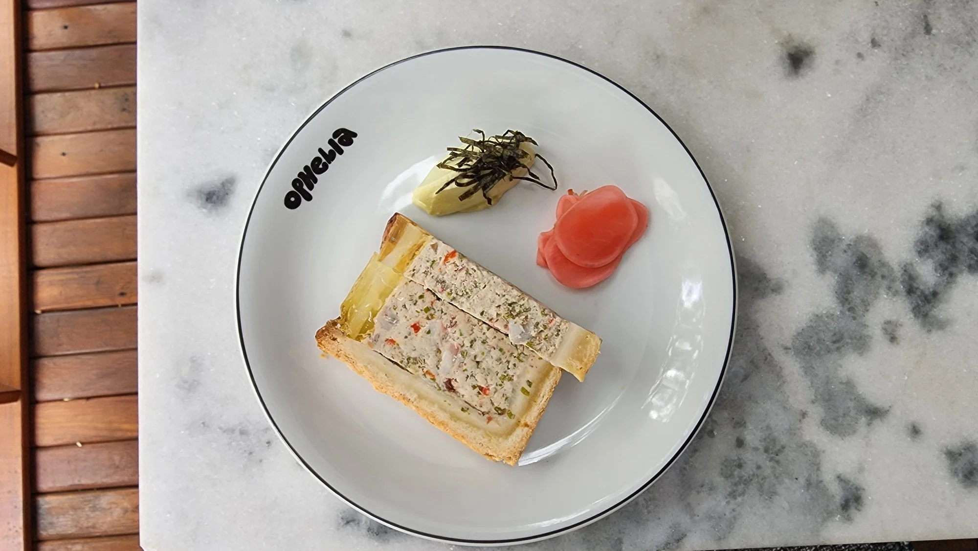 Paté en croute de pulpo, pescado y pastrami